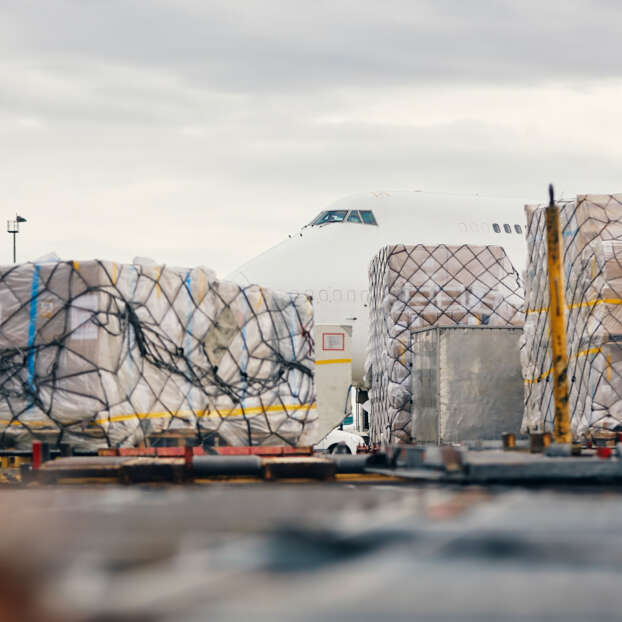 Loading freight containers to the aircraft at the airport